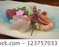 Assorted sashimi served with flowers 123757033