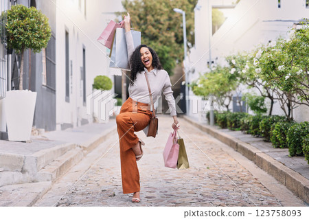 Happy, excited and woman with shopping on outdoor path with smile. Happiness, fashion and city girl with bag from discount sale. Retail therapy, luxury and customer in celebration on street with bag. Happy, excited and woman with shopping on outdoor path with smile. Happiness, fashion and city girl with bag from discount sale. Retail therapy, luxury and customer in celebration on street with bag. 123758093