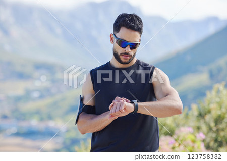 Sports man time smartwatch in outdoor fitness, training exercise time for mountain marathon and tracking heartbeat. Digital stopwatch for workout, monitor performance with technology and runner rest Sports man time smartwatch in outdoor fitness, training exercise time for mountain marathon and tracking heartbeat. Digital stopwatch for workout, monitor performance with technology and runner rest 123758382