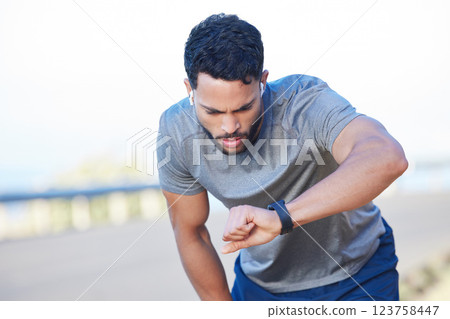 Tired runner, fitness training and man health check on smart watch. Sports athlete training, healthy lifestyle exercise motivation and tracking heartbeat, pulse and measuring speed outdoors Tired runner, fitness training and man health check on smart watch. Sports athlete training, healthy lifestyle exercise motivation and tracking heartbeat, pulse and measuring speed outdoors 123758447