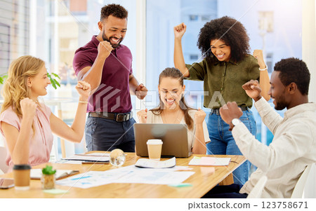 Happy team celebrate success, sales target business meeting with laptop and staff teamwork goal achievement. Young casual people smile, group working collaboration and company pride in victory fist 123758671