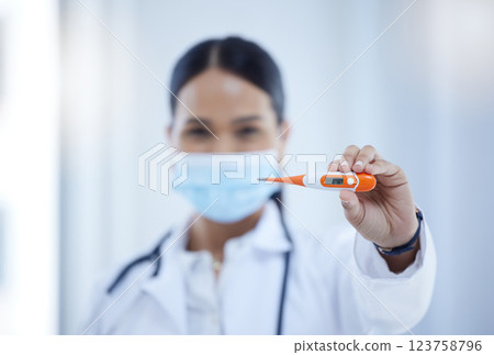 Covid, health thermometer check and doctor woman mask of a hospital worker. Portrait of a hospital, medical clinic and healthcare employee from Spain help with dengue nursing and fever monitoring 123758796