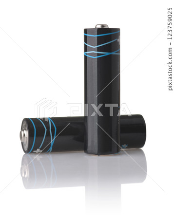 Front view of  two black AA alkaline batteries 123759025
