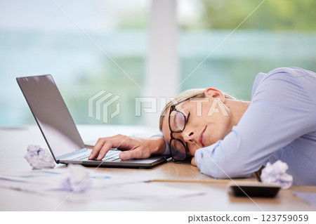 Business woman sleeping at laptop desk, burnout stress from fatigue and insomnia problem in workplace career at computer. Office worker tired, risk job loss and overworked person nap at tech company 123759059