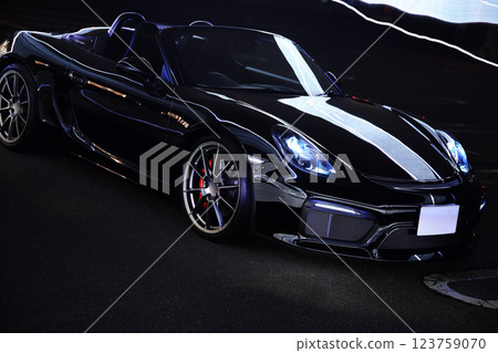 A shiny black convertible 123759070