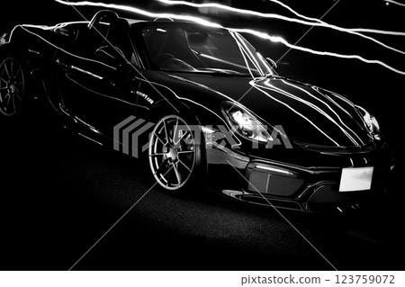 A shiny black convertible 123759072