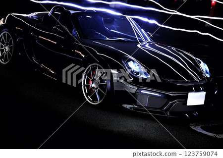 A shiny black convertible 123759074