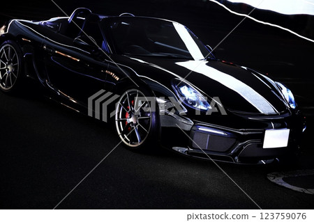 A shiny black convertible A shiny black convertible 123759076