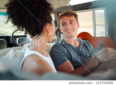 Camper, van and couple relax while travel, happy, talking and bonding in their vehicle together. Love, freedom and content woman and man enjoying their journey and vacation exploring and having fun 123759086