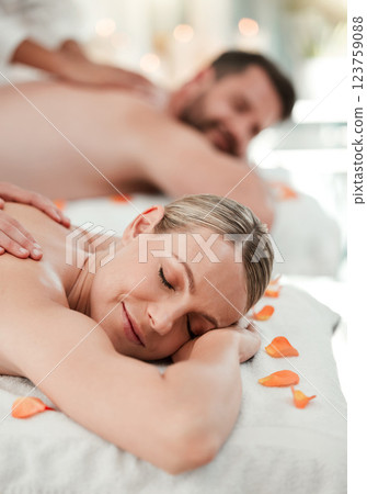 Wellness, beauty and couple massage at spa for health and relax in zen resort, peaceful and happy. Salon, luxury and man and woman enjoy treatment by massage therapist on their vacation in Thailand Wellness, beauty and couple massage at spa for health and relax in zen resort, peaceful and happy. Salon, luxury and man and woman enjoy treatment by massage therapist on their vacation in Thailand 123759088