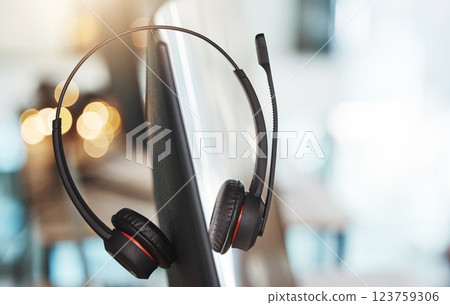 Computer, headphones and call center telemarketing background in office for contact us, virtual online consulting and sales agency. Zoom of customer service technology for receptionist communication Computer, headphones and call center telemarketing background in office for contact us, virtual online consulting and sales agency. Zoom of customer service technology for receptionist communication 123759306