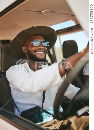 Travel, freedom and summer with black man driving in car on road trip vacation for adventure, happy and journey. Transportation, excited and smile with young guy and sunglasses in van for holiday Travel, freedom and summer with black man driving in car on road trip vacation for adventure, happy and journey. Transportation, excited and smile with young guy and sunglasses in van for holiday 123759500