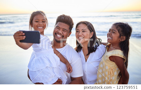 Family selfie, happy beach and parents on ocean holiday with children in Cancun and smile for international vacation by the sea. Girl siblings taking photo on phone with mother and father in nature Family selfie, happy beach and parents on ocean holiday with children in Cancun and smile for international vacation by the sea. Girl siblings taking photo on phone with mother and father in nature 123759551