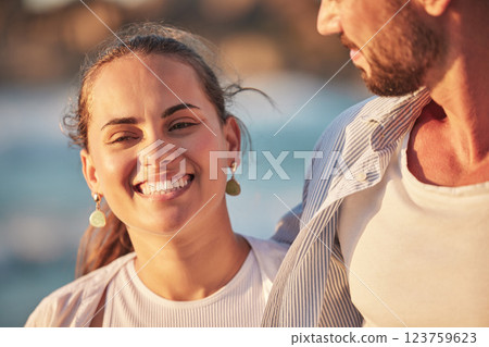 Love, smile and ocean, a happy woman with man on a summer holiday at the beach. Romance, nature and sun, a couple from Mexico walking by the sea. Happiness, sunset and romantic vacation time together 123759623