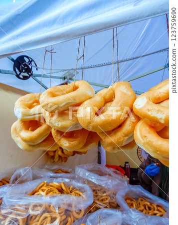 street market selling a variety of bagels . High quality photo street market selling a variety of bagels . High quality photo 123759690