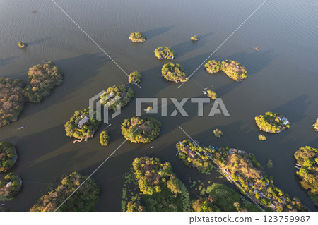 Many small green islands Many small green islands 123759987