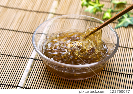 Tokoroten_Served in a glass bowl on a bamboo mat Tokoroten_Served in a glass bowl on a bamboo mat 123760077