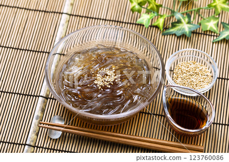 Tokoroten_Served in a glass bowl on a bamboo mat Tokoroten_Served in a glass bowl on a bamboo mat 123760086