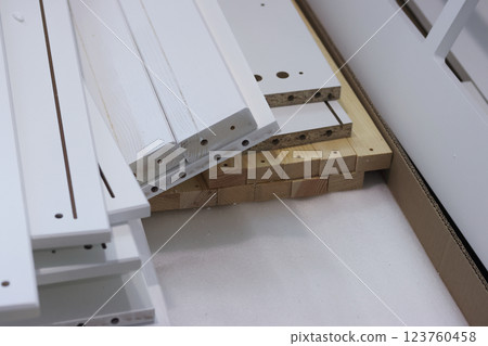 A set of elements for assembling an ottoman. 123760458