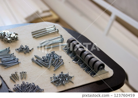 A set of elements for assembling an ottoman. 123760459