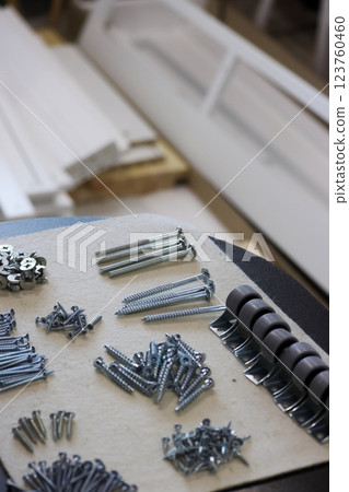 A set of elements for assembling an ottoman. A set of elements for assembling an ottoman. 123760460