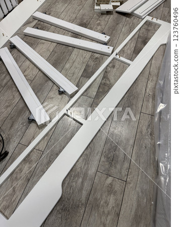 A set of elements for assembling an ottoman. 123760496