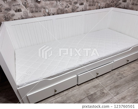 A set of elements for assembling an ottoman. A set of elements for assembling an ottoman. 123760501