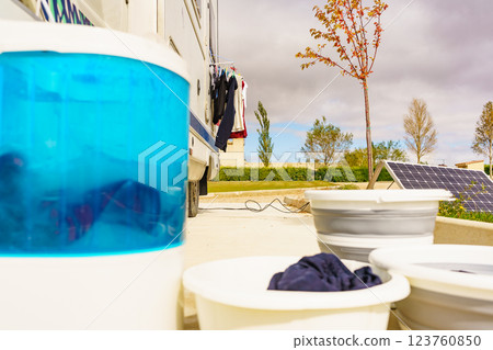 Washing laundry outdoor at caravan Washing laundry outdoor at caravan 123760850
