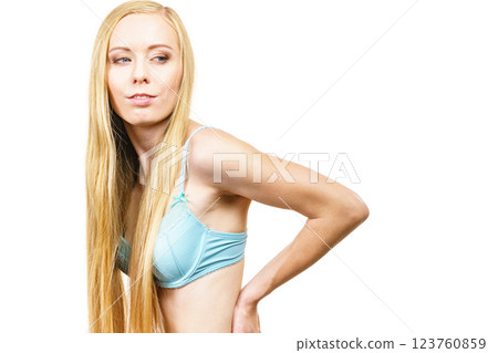 Girl long blond hair wearing bra Girl long blond hair wearing bra 123760859
