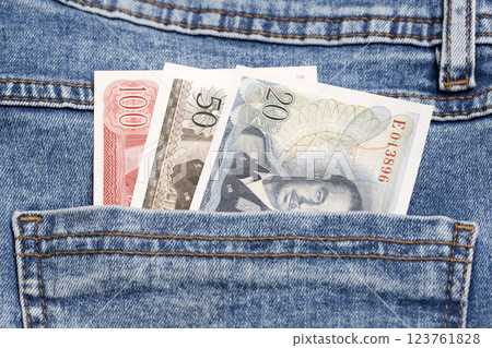 Luxembourg franc in the pocket of blue jeans 123761828
