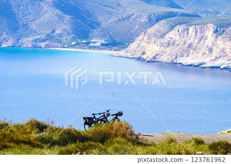 Coast view with two bicycles on shore 123761962