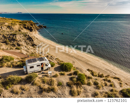 Caravan with solar panels on roof camp on sea, Spain. Aerial view. Caravan with solar panels on roof camp on sea, Spain. Aerial view. 123762101
