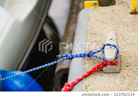 Metal cleat with line. Yachting Metal cleat with line. Yachting 123762134