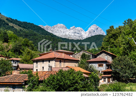 A scenic view of Oseja de Sajambre, Spain, with traditional stone buildings 123762482