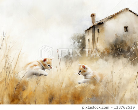 Two playful kittens frolicking in a golden field near an old farmhouse Two playful kittens frolicking in a golden field near an old farmhouse 123762539