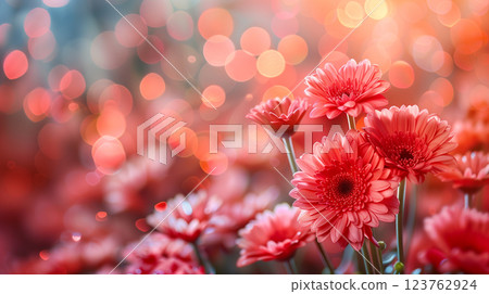 Gerbera flower in red color with a backdrop of green garden Gerbera flower in red color with a backdrop of green garden 123762924