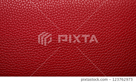 Red leather background. Closeup of eco leather texture 123762973