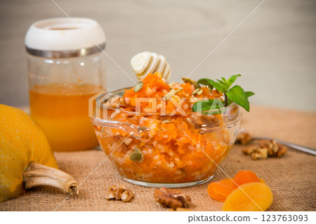 Pumpkin cooked with rice, nuts and honey Pumpkin cooked with rice, nuts and honey 123763093