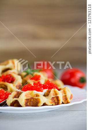 Homemade potato waffles with caviar and herbs for breakfast 123763118