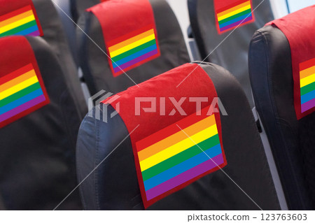 Rainbow flag LGBTQ Flag on Empty seat in plane. Travel, flight and transportration concept 123763603