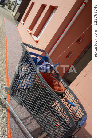 Painting tools and materials in use during a home renovation project on a sunny day at a residential 123763746