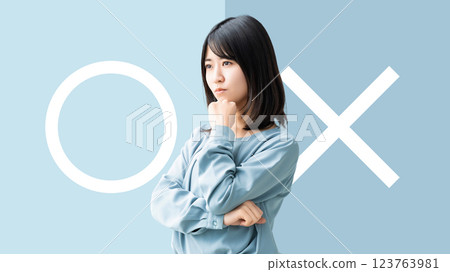 A woman who thinks, "Yes or no" 123763981