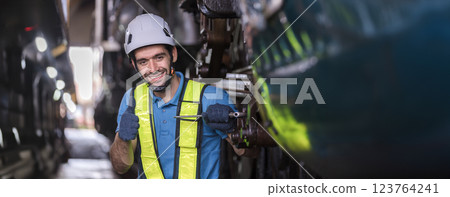 Engineer checking construction process railway and checking work on railroad station . Engineer checking construction process railway and checking work on railroad station . 123764241