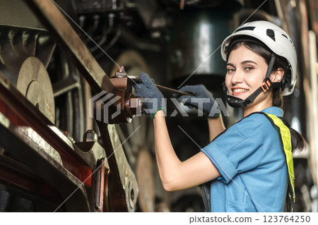 Engineer checking construction process railway and checking work on railroad station .  123764250