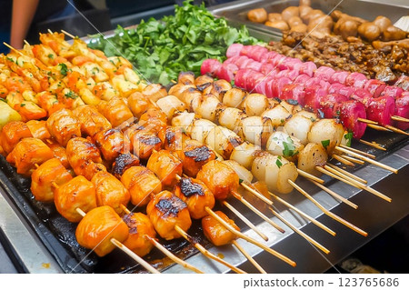 Various skewered dishes at a market in Southeast Asia. Street food 123765686