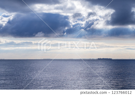 Baltic Sea water sparkles under a dramatic cloudy sky Baltic Sea water sparkles under a dramatic cloudy sky 123766012
