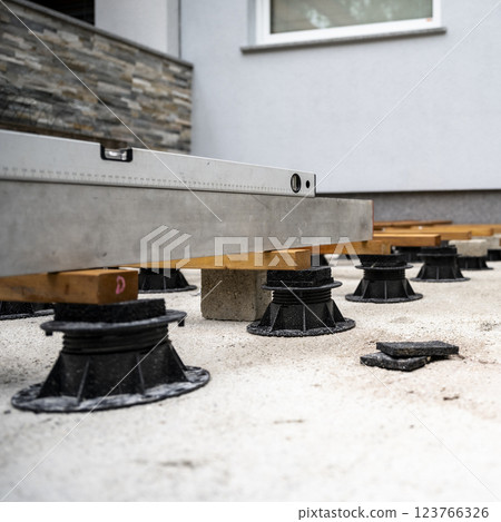 Adjustable pedestal deck construction Adjustable pedestal deck construction 123766326