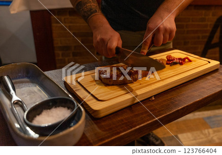 Cutting the meat 123766404
