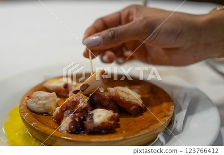 Cooked octopus dish 123766412