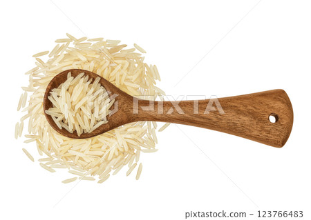 rice basmati in a wooden spoon isolated on white background. Top view. Flat lay rice basmati in a wooden spoon isolated on white background. Top view. Flat lay 123766483